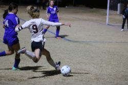 Kylie playing soccer