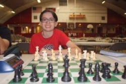 A student playing chess