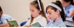 Girls reading in class