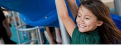 Girl playing on a playground