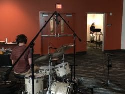 Drums and clarinet in sperarate rooms