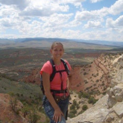 teacher standing at grand canyon