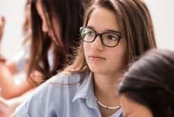 female student wearing glasses