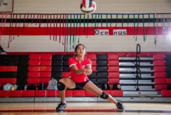 female student playing volleyball