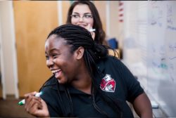 female high school student laughing