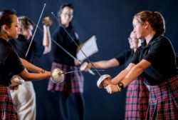 high school students in theatre rehersal