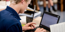 boy student on laptop