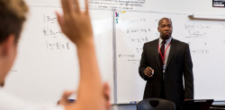 teacher at white board