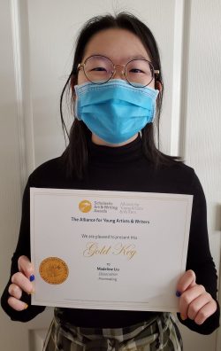 girl holding certificate