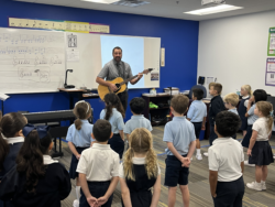 Kristofer McCoy teaching music