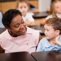 Dr. Toyin Atolagbe with a student
