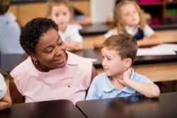 Dr. Toyin Atolagbe with a student