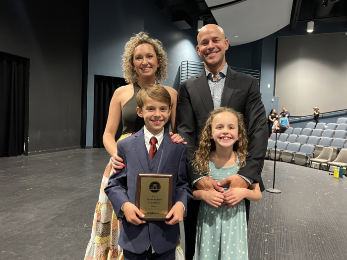 Bard winner with his family