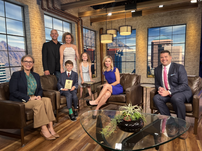 Bard winner, Lincoln Carpenter with his family and headmaster at Fox 10 studio