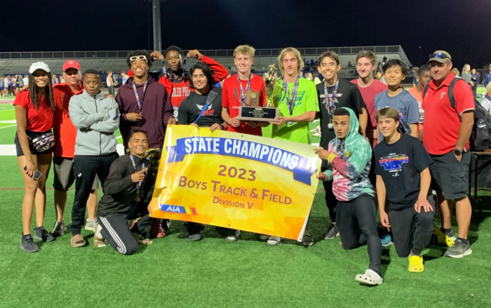 Chandler Prep Boys Track & Field Team with State Champions Banner