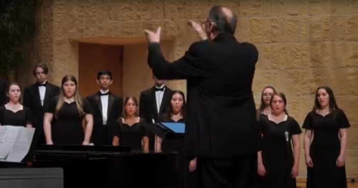 Dr. Tom Bookhout with Honors Choir