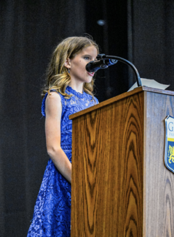 Archway Glendale scholar giving her virtue speech at 5th grade promotion
