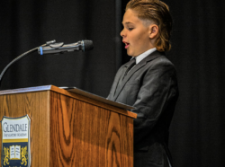 Archway Glendale scholar giving his virtue speech at 5th grade promotion