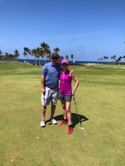 Director of College Counseling, Roslyn, with her husband on a golf course.