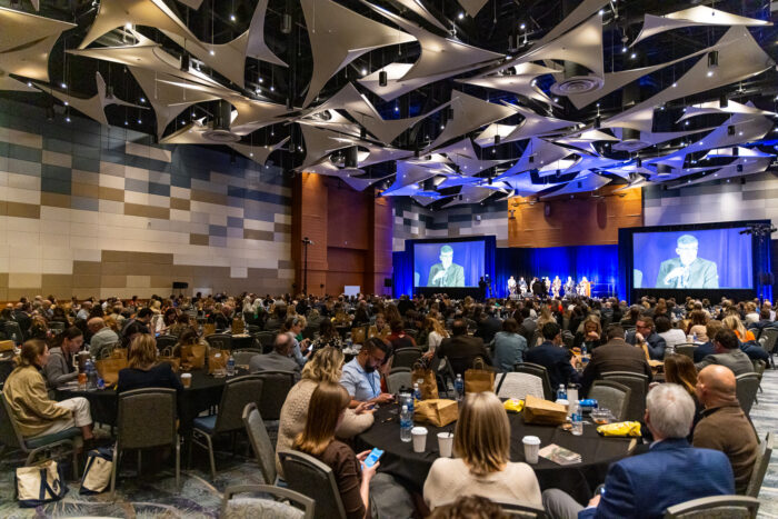 a panel of presenters on stage at The 2023 National Symposium for Classical Education.