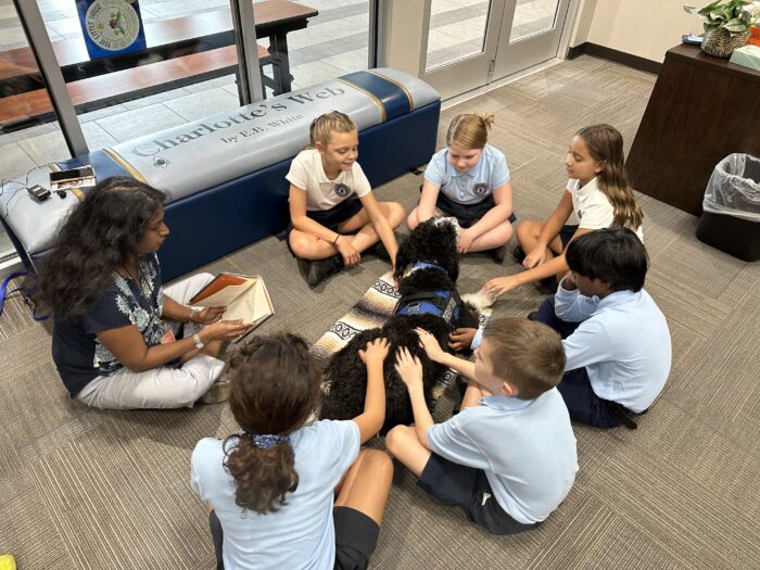 Archway Glendale Therapy Dog with group of students