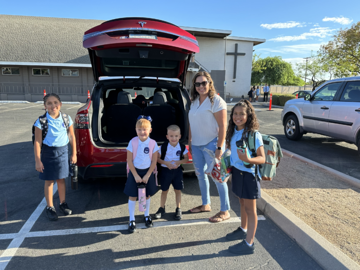 Students at first day of school with parent