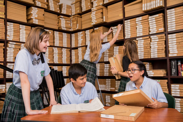 high school students in a library