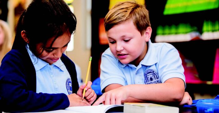 Students doing math problems together