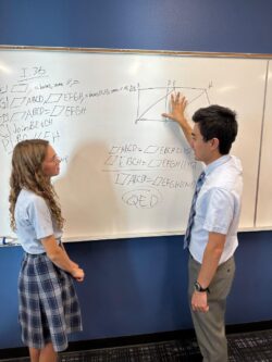 Brandon Wang with a student.