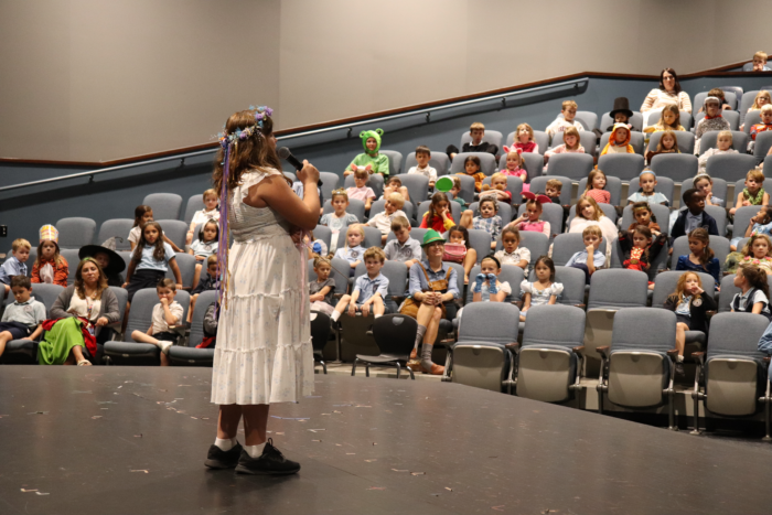 Student telling story in costume for Great Hearts, Great Books Day