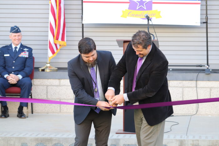 Headmasters at Archway Trivium and Trivium Prep cutting the purple ribbon
