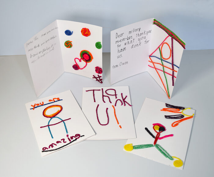 Cards made by North Phoenix students for traveling military with Wikki Stix