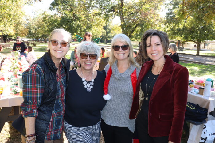 Four Office Managers posing together