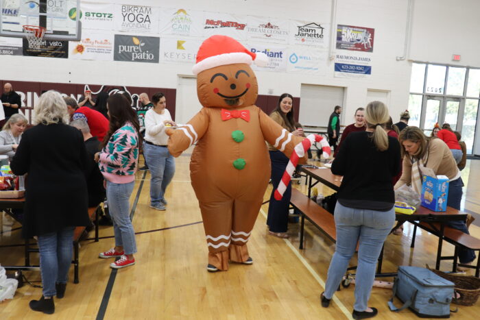Gingerbread Man visiting a gingerbread contest