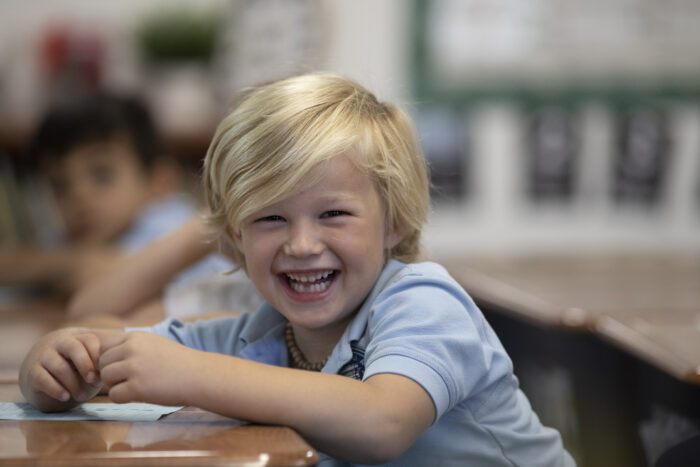 young boy laughing