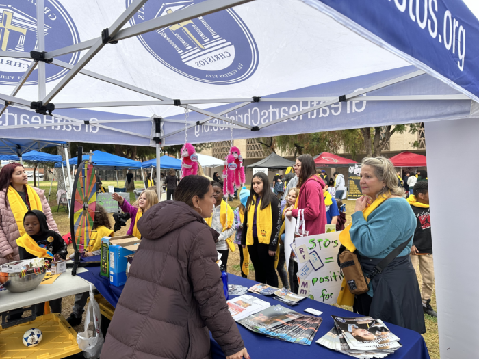 Attendees at Christos Booth at a School Choice event