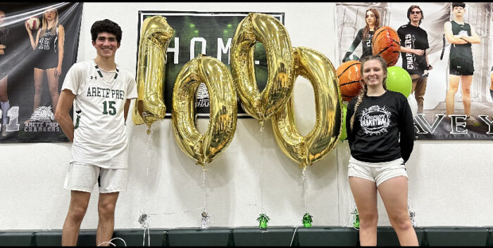 Arete Prep basketball players with "1,000" ballons
