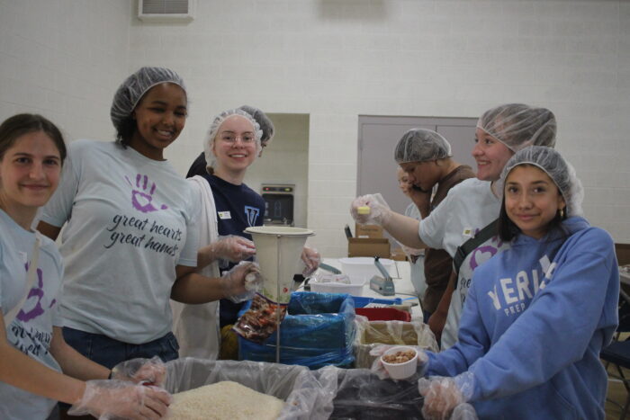 Students at a food packaging event