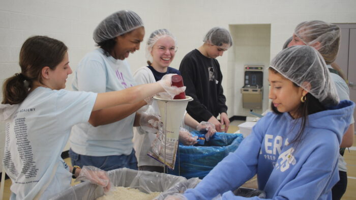 Students at a food packaging event