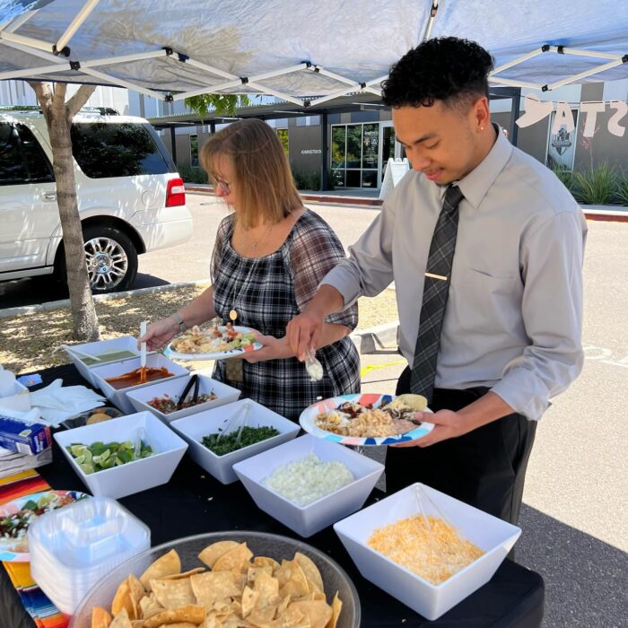 Two teachers enjoying Taco Tuesday.