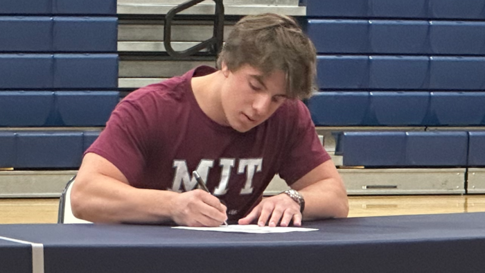 Scottsdale senior athlete signing his letter of intent