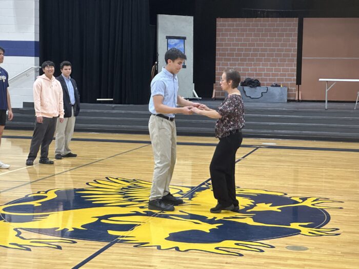 Student from Glendale Prep with dance teacher at dance lessons for prom.