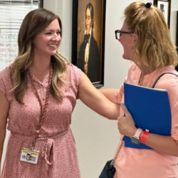 Teacher greeting a parent