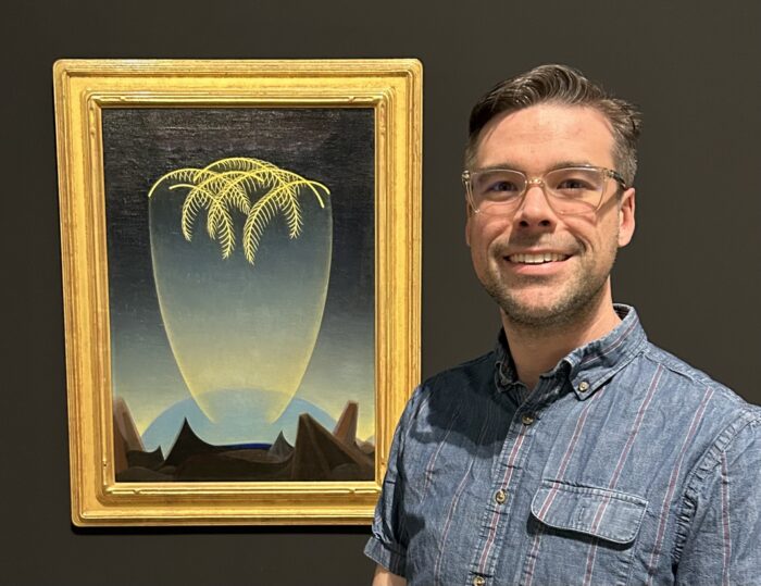 Mr. Demerest-Smith and the painting, "Messengers"