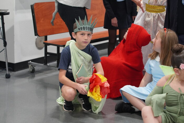 Student dressed as Statue of Liberty