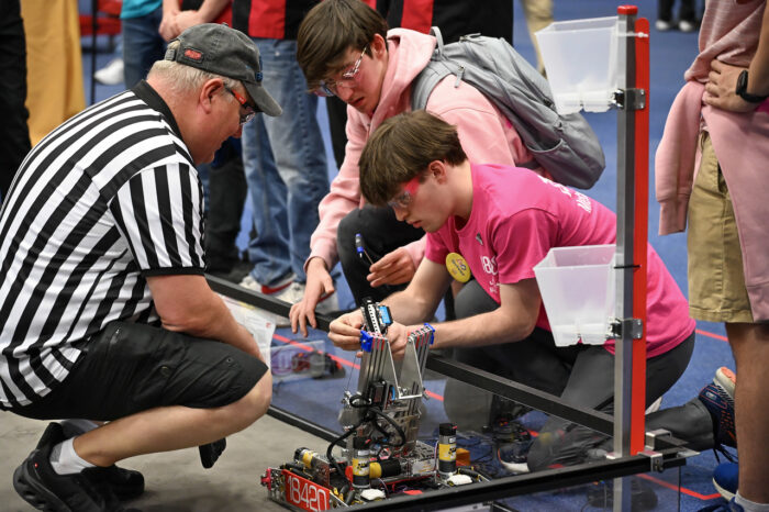 Students working on a robot