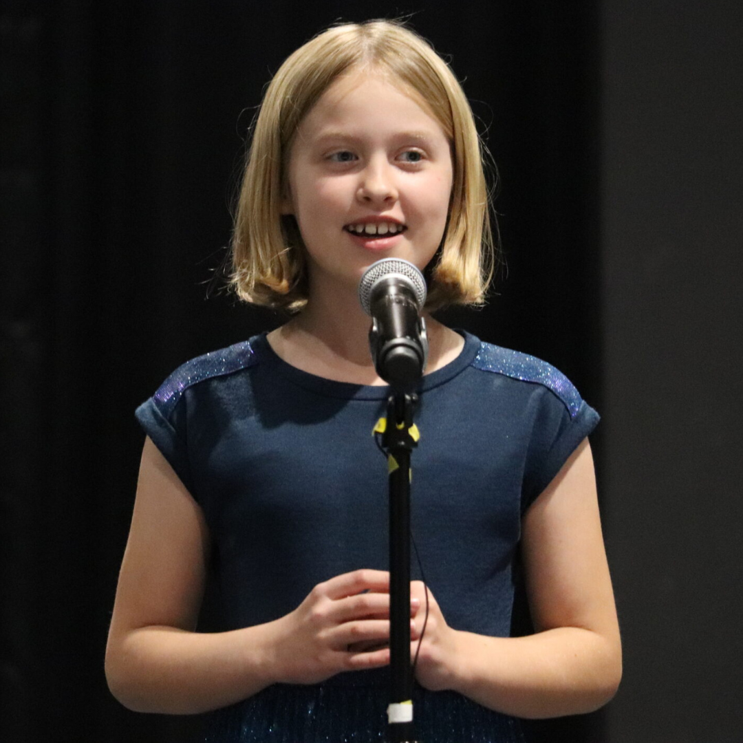 Student at a microphone
