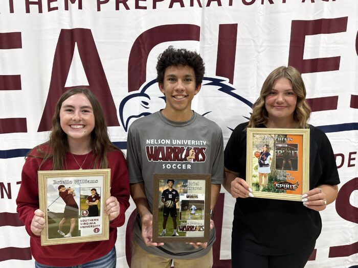 3 students holding photos