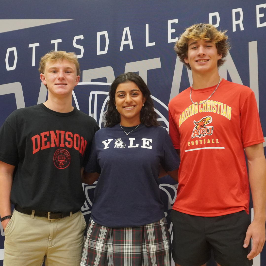 Three student athletes standing together