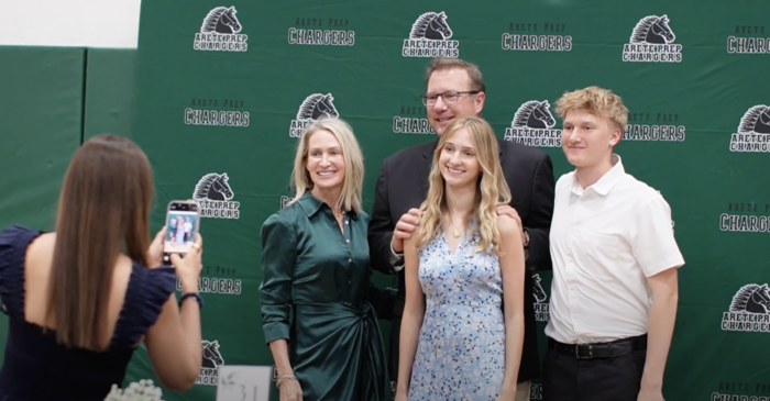 A family having a photo taken